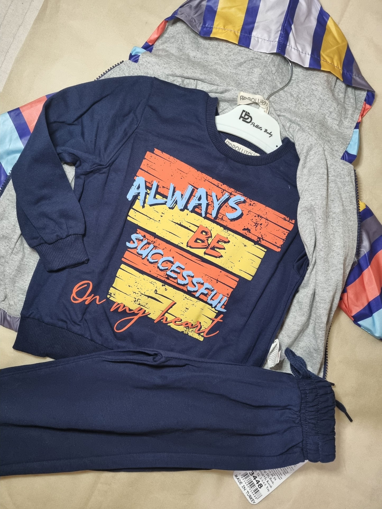 Set with long sleeves and jacket for a boy